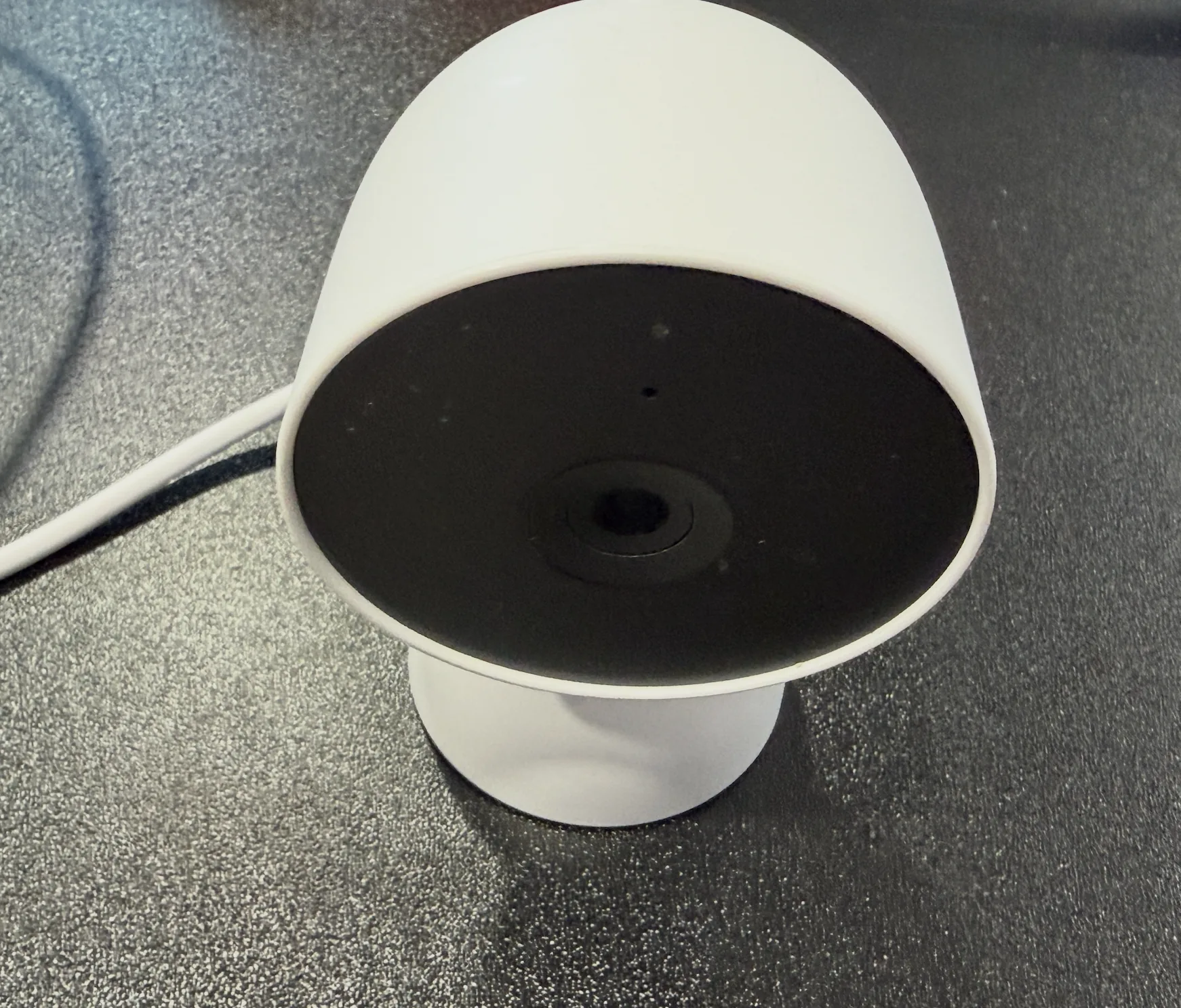 Google Nest Cam battery model on a desk before we upgraded to the UniFi G6 Turret at our NJ shop