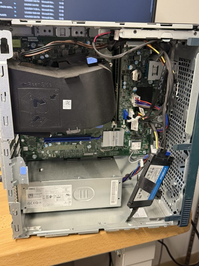 SSD taped inside a Dell desktop case instead of mounted with screws, brought to Dave's Computers in Somerville NJ after a big box repair