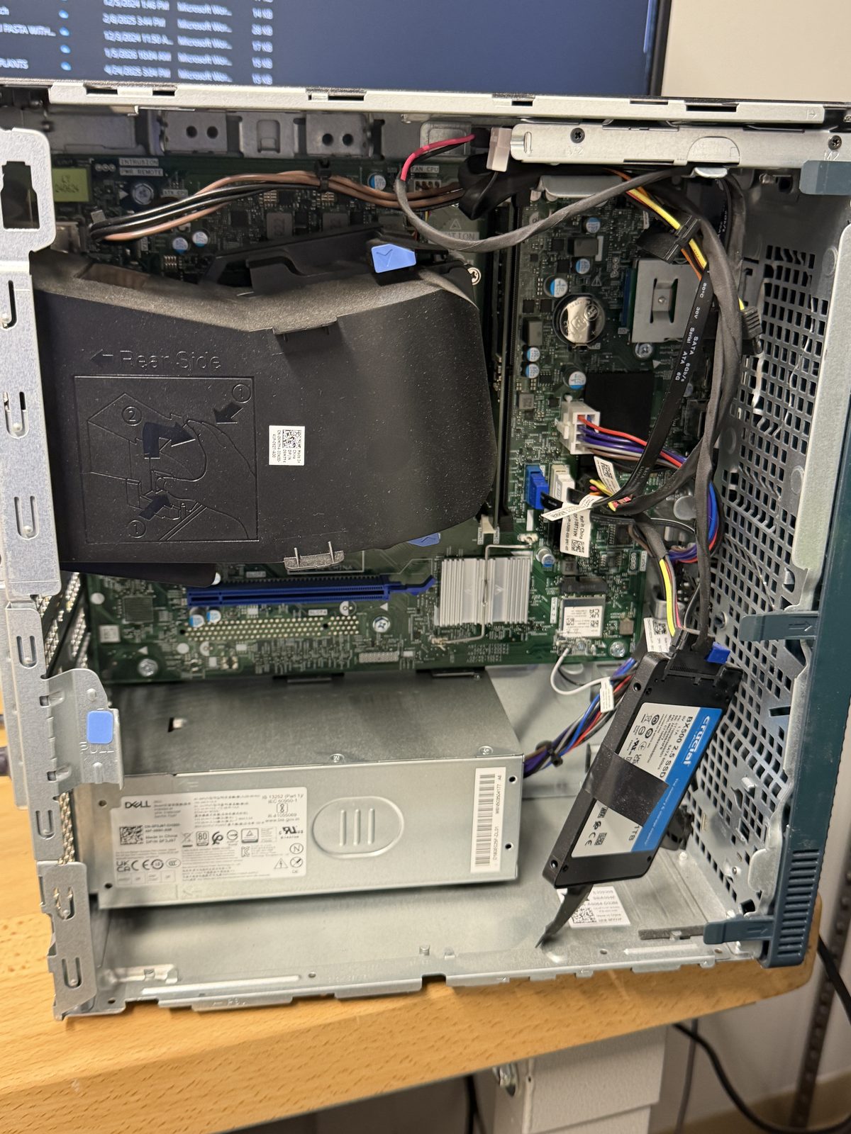 SSD taped inside a Dell desktop case instead of mounted with screws, brought to Dave's Computers in Somerville NJ after a big box repair
